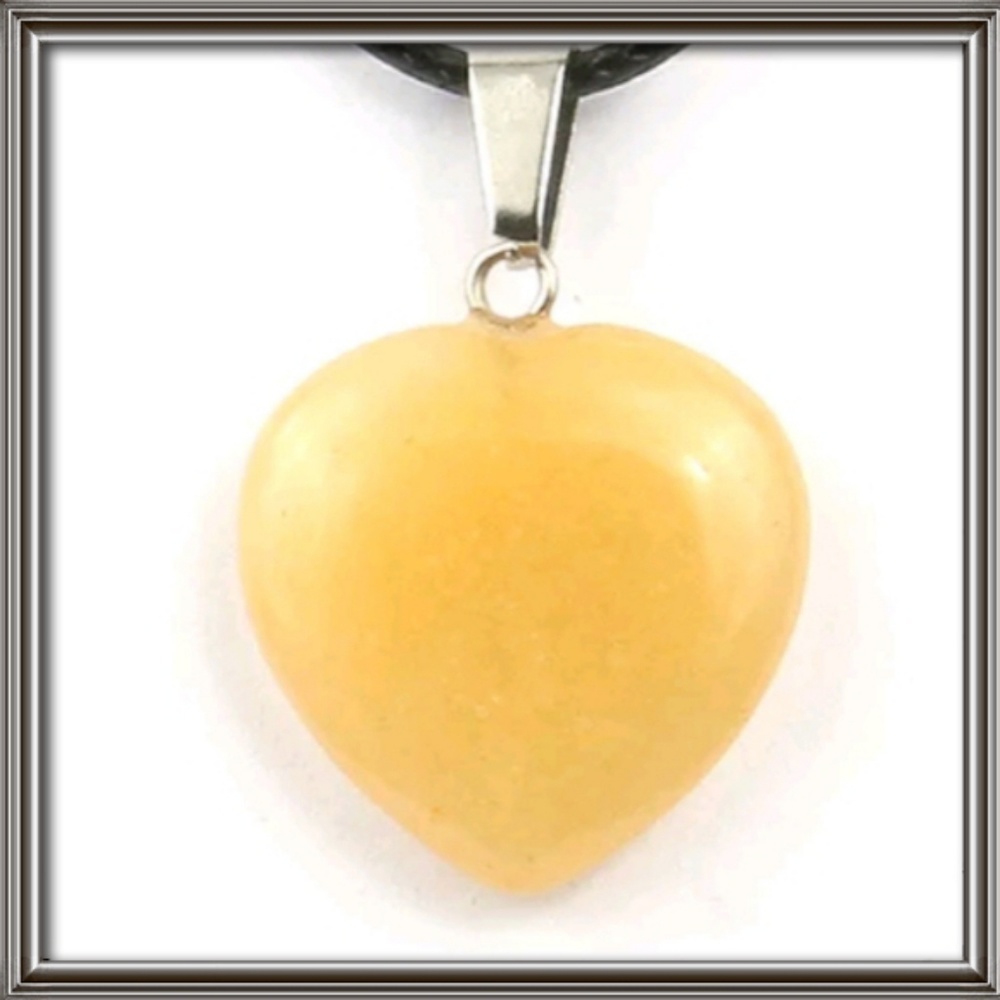 Yellow jade heart pendants on real silver chains.